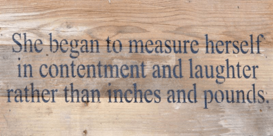 She began to measure herself in con... Wall Sign