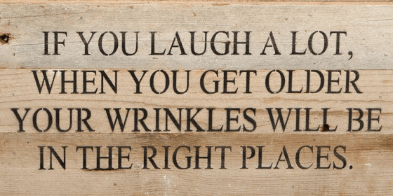 If you laugh a lot, when you get...  Wall Sign