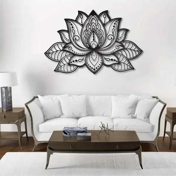 Black lotus wall art over a white sofa